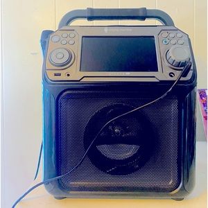 PRICE REDUCED- 50 % OFF! New Groove karaoke machine with new microphone